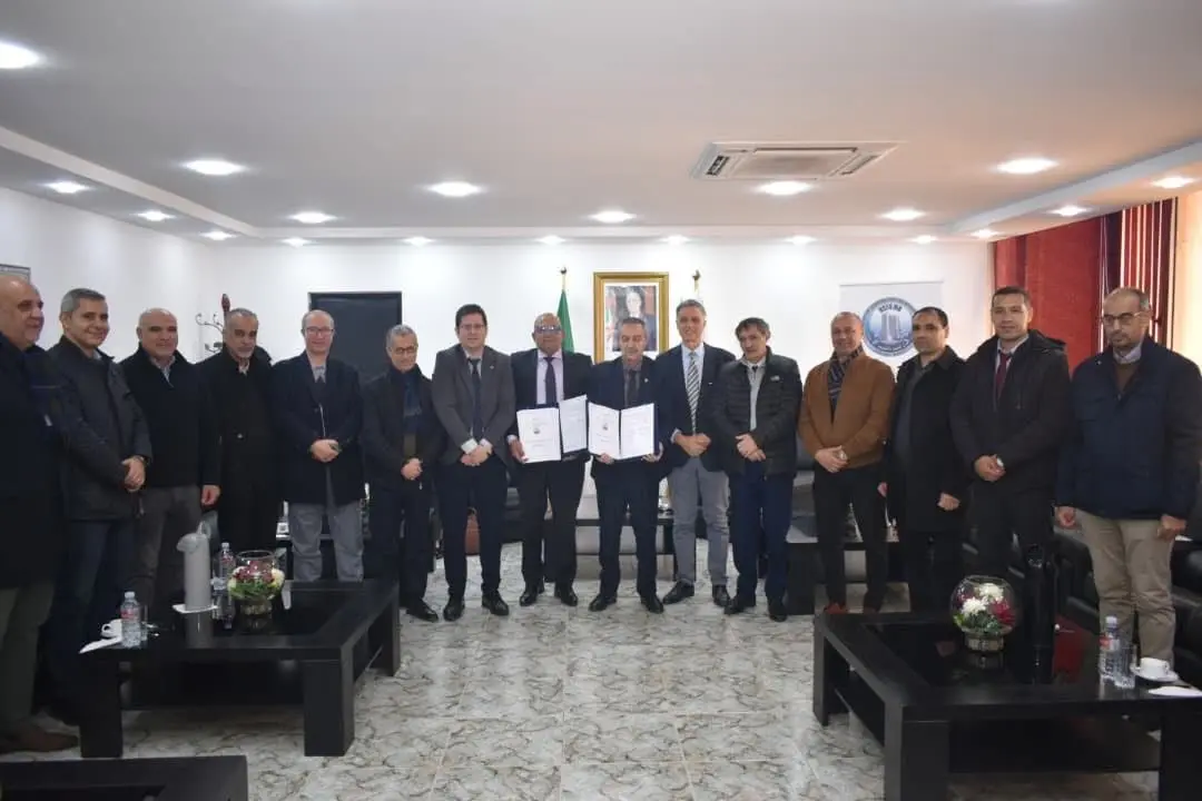 Education Tech and USTO-MB representatives with their signed partnership agreements, in Oran.